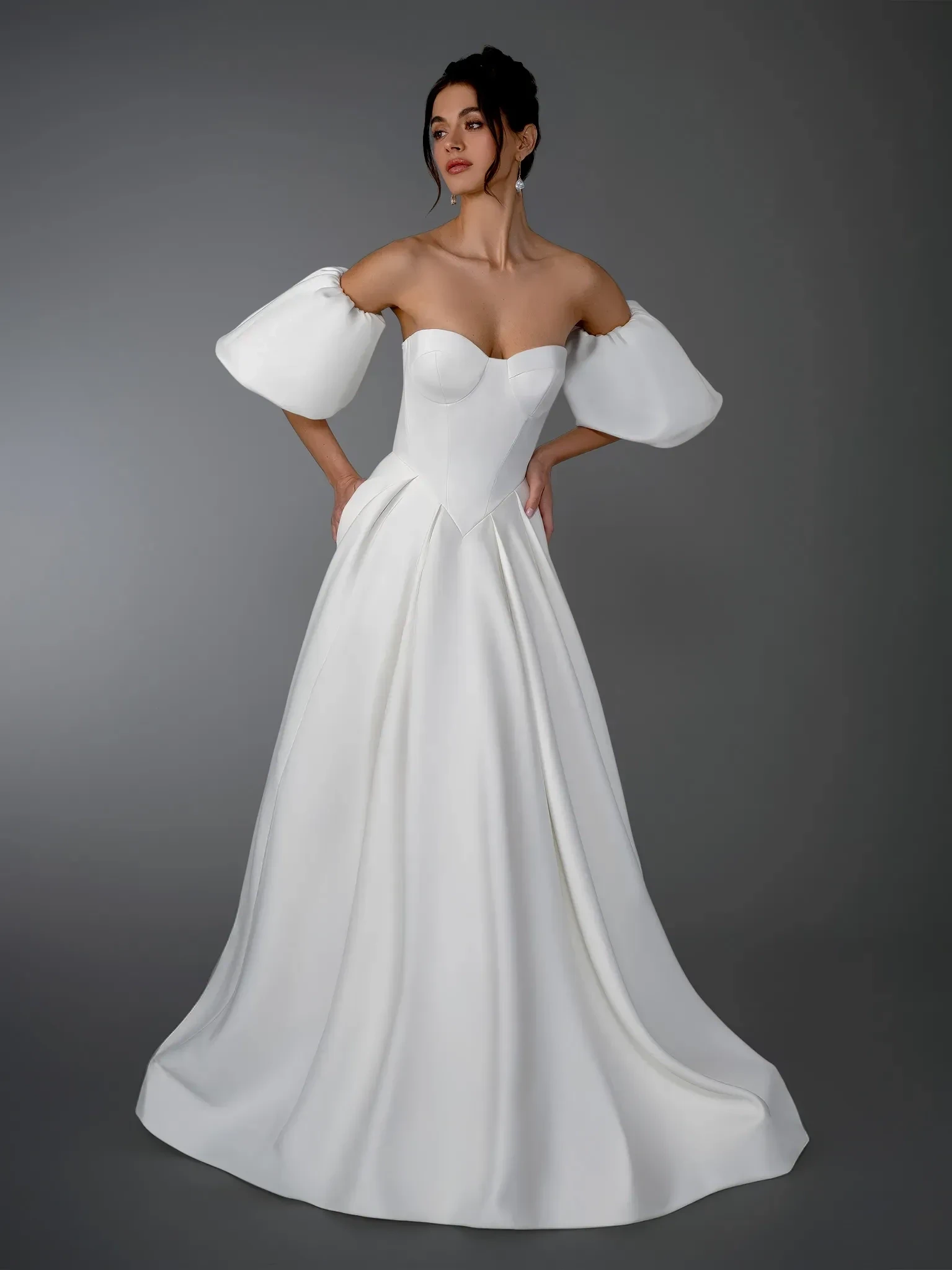 Model wearing a gown by Stella Couture
