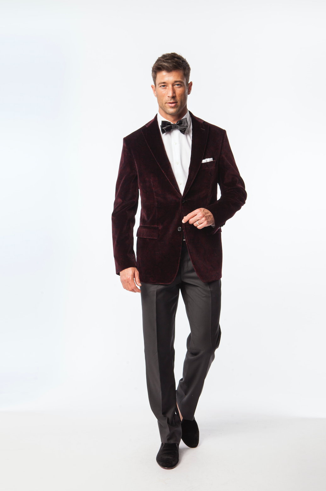 Model wearing a dark-red suit